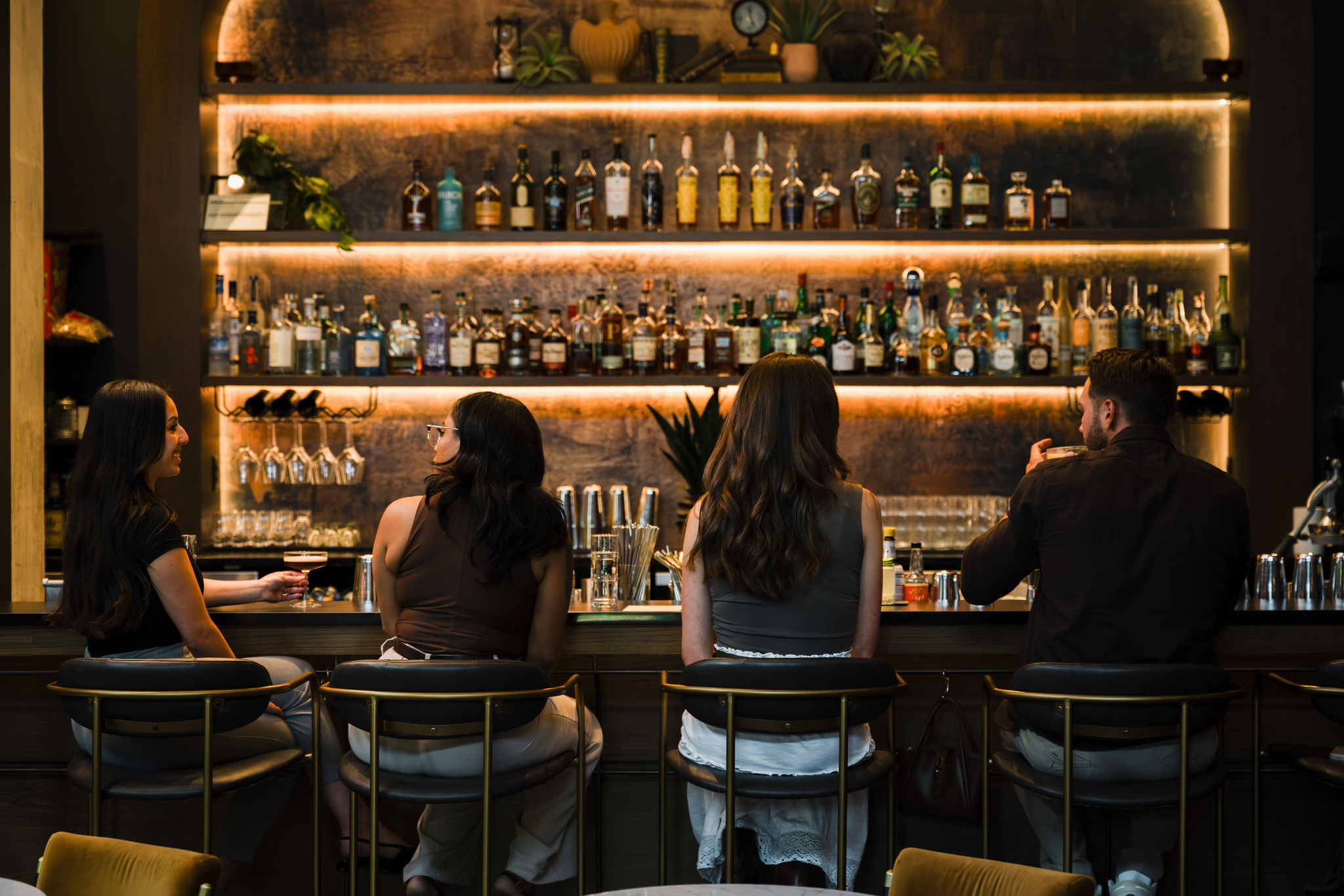 Antagonist Patrons people sitting at a bar