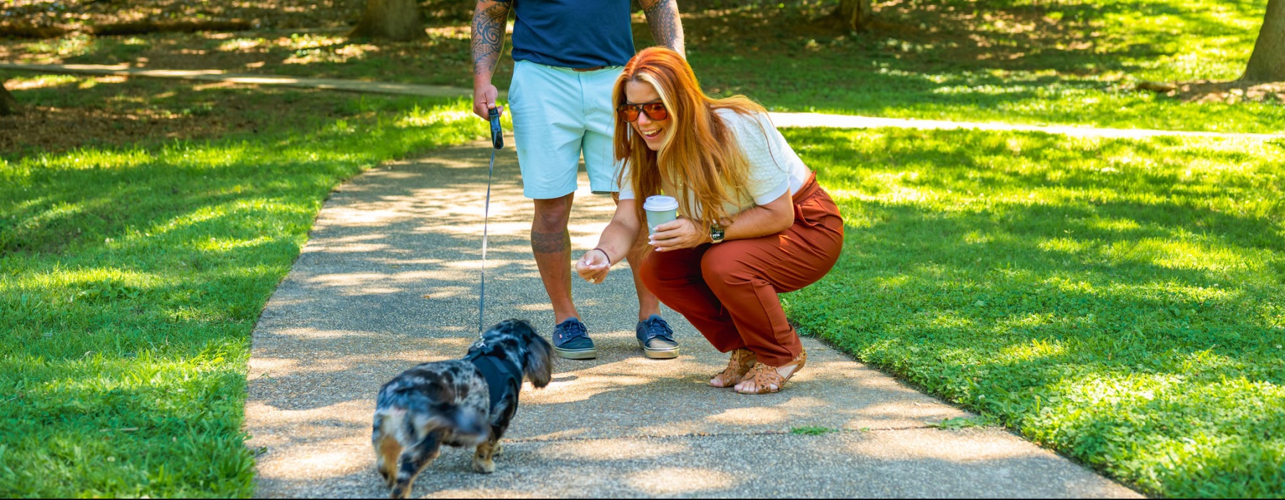 woman petting a dog