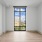 A large room with a floor-to-ceiling window