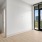 A large living room with a balcony