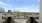 tables and chairs on rooftop terrace with city views