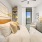 bedroom with bookshelves