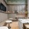 clubroom with tables, chairs and wall mounted tvs