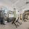 large gym with a variety of workout equipment