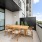 table and chairs on large private balcony